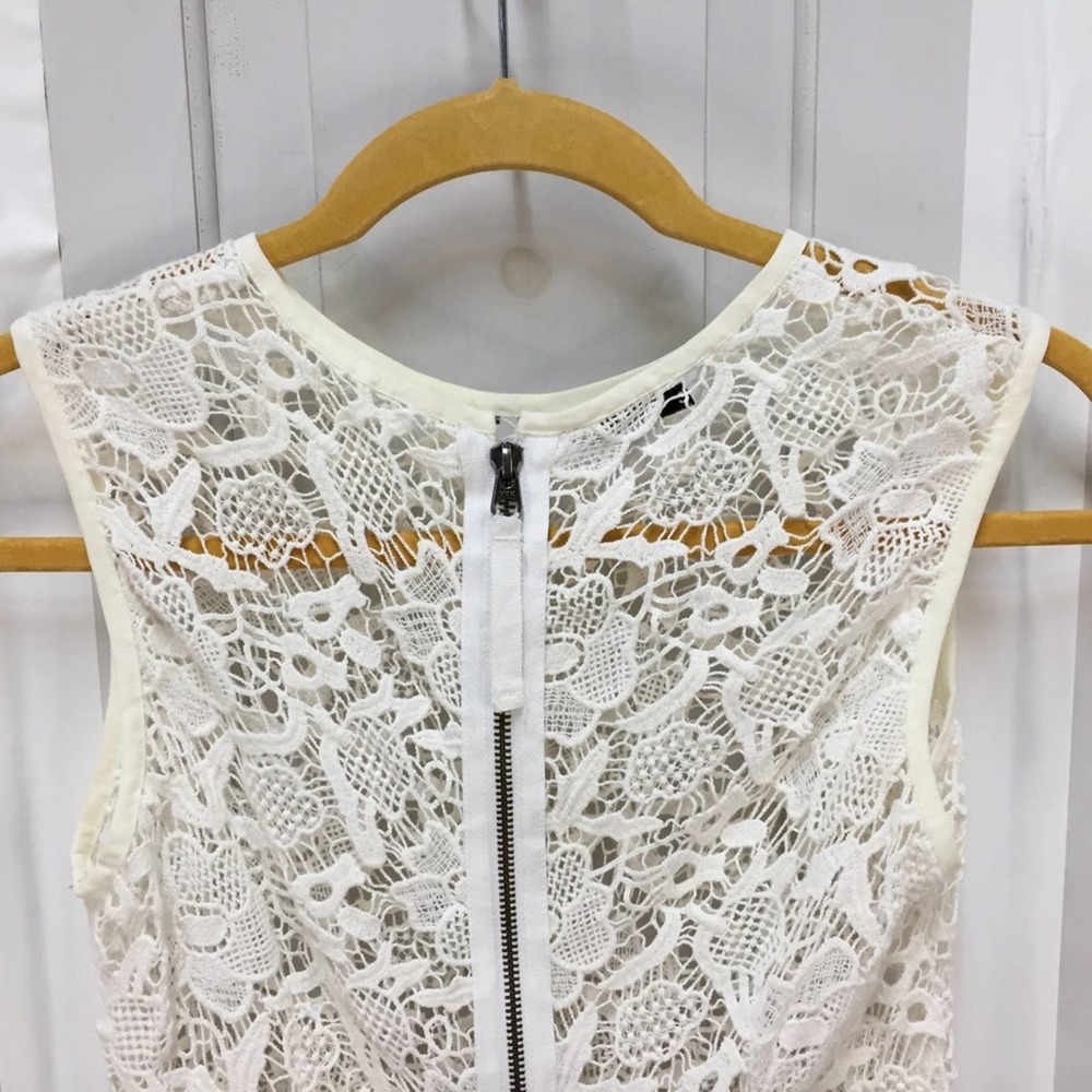 CAbi White Crocheted Lace Sheer Peplum Top - Picture 16 of 16